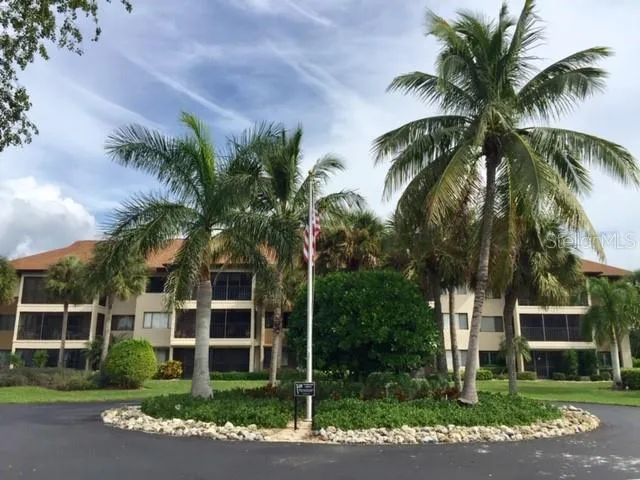 a view of a palm trees in front of a house
