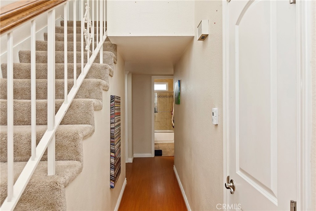 1834 West Las Palmas Circle Orange, CA 92868 - Photo 11 of 25 a view of a hallway with wooden floor and staircase