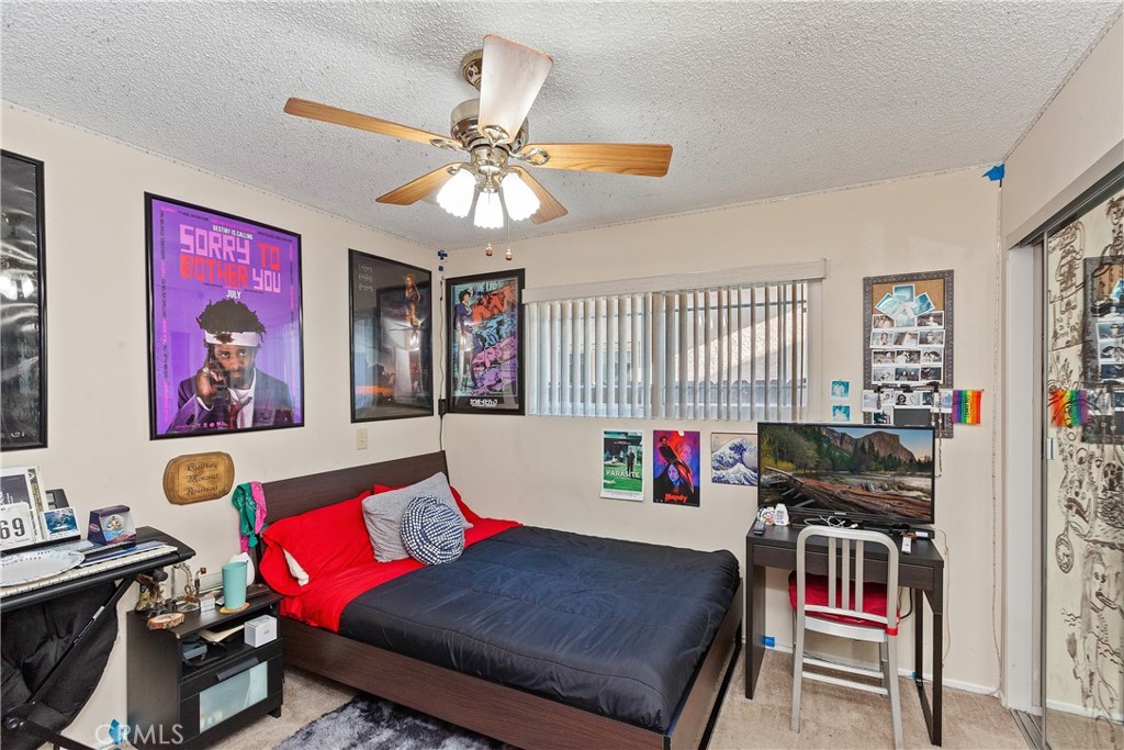 1834 West Las Palmas Circle Orange, CA 92868 - Photo 12 of 25 a living room with furniture and a flat screen tv