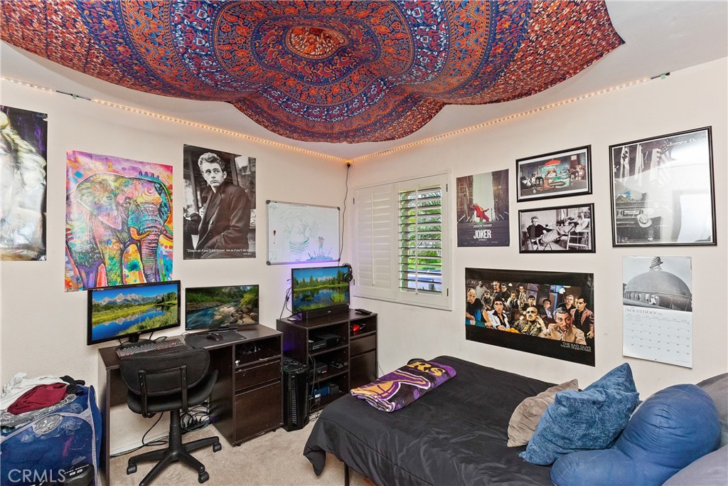 1834 West Las Palmas Circle Orange, CA 92868 - Photo 16 of 25 a bedroom with furniture and a window