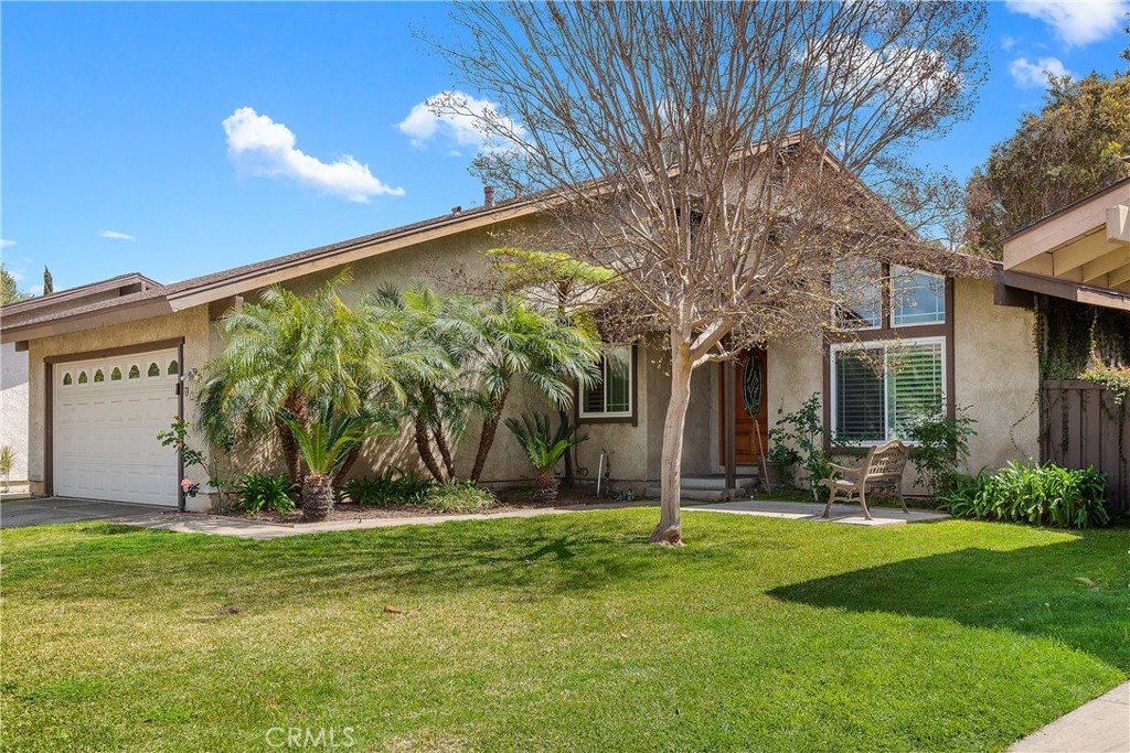 1834 West Las Palmas Circle Orange, CA 92868 - Photo 2 of 25 a view of backyard with a garden and plants