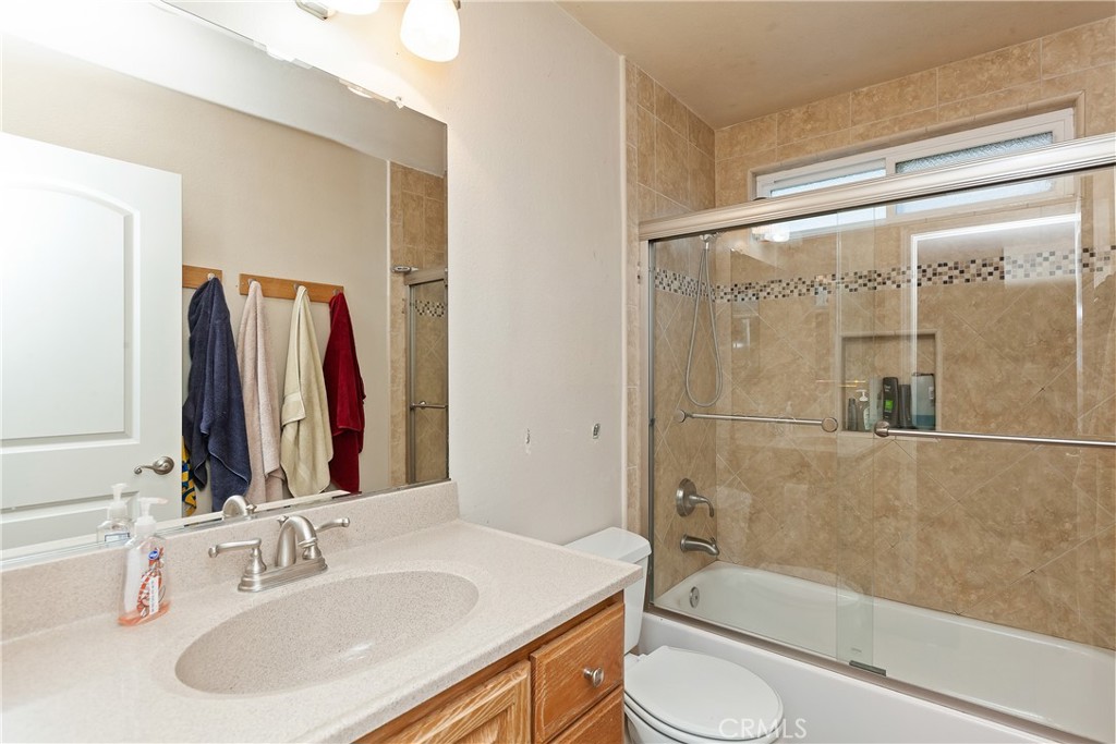 1834 West Las Palmas Circle Orange, CA 92868 - Photo 21 of 25 a bathroom with a sink and a mirror