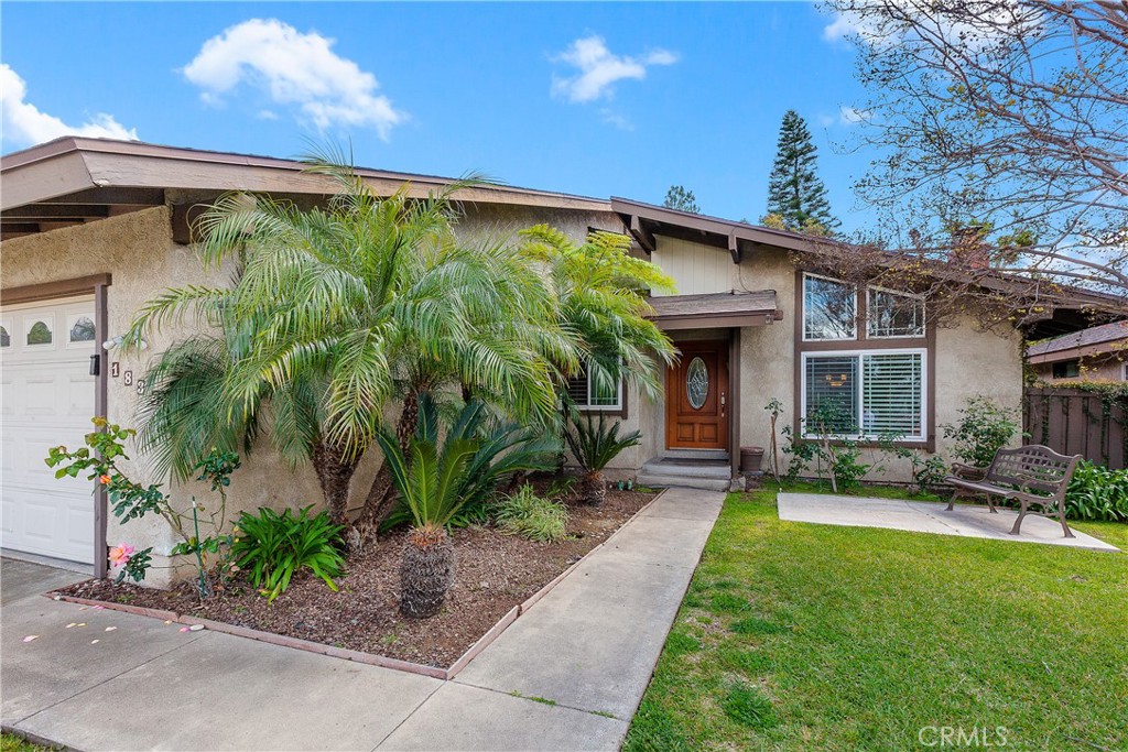 1834 West Las Palmas Circle Orange, CA 92868 - Photo 3 of 25 a front view of a house with garden