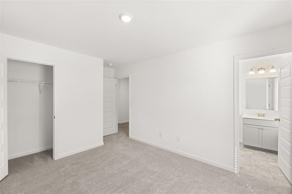 1787 Goodwin Drive Hampton, GA 30228 - Photo 14 of 55 an empty room with a bathroom