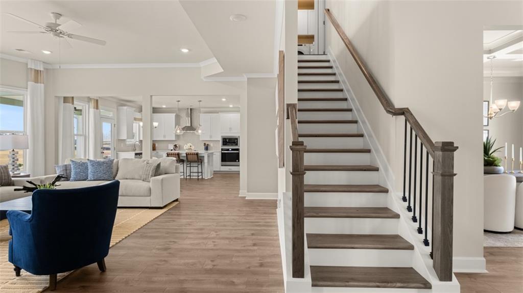 1787 Goodwin Drive Hampton, GA 30228 - Photo 26 of 55 a living room with furniture and wooden floor