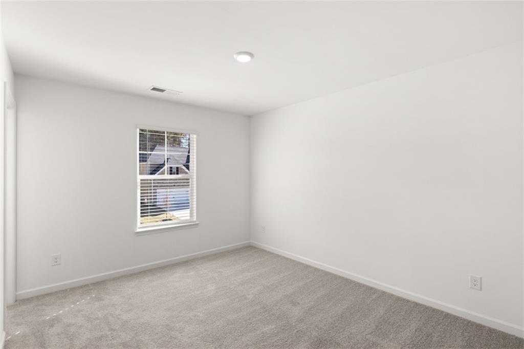 1787 Goodwin Drive Hampton, GA 30228 - Photo 37 of 55 an empty room with a window