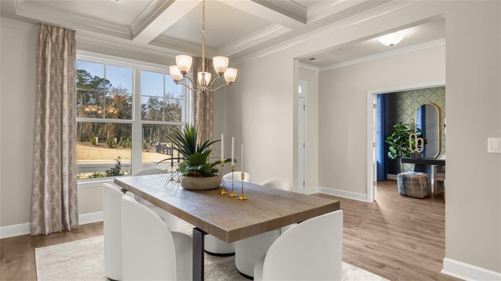 1787 Goodwin Drive Hampton, GA 30228 - Photo 9 of 55 a view of a dining room with a table and chairs