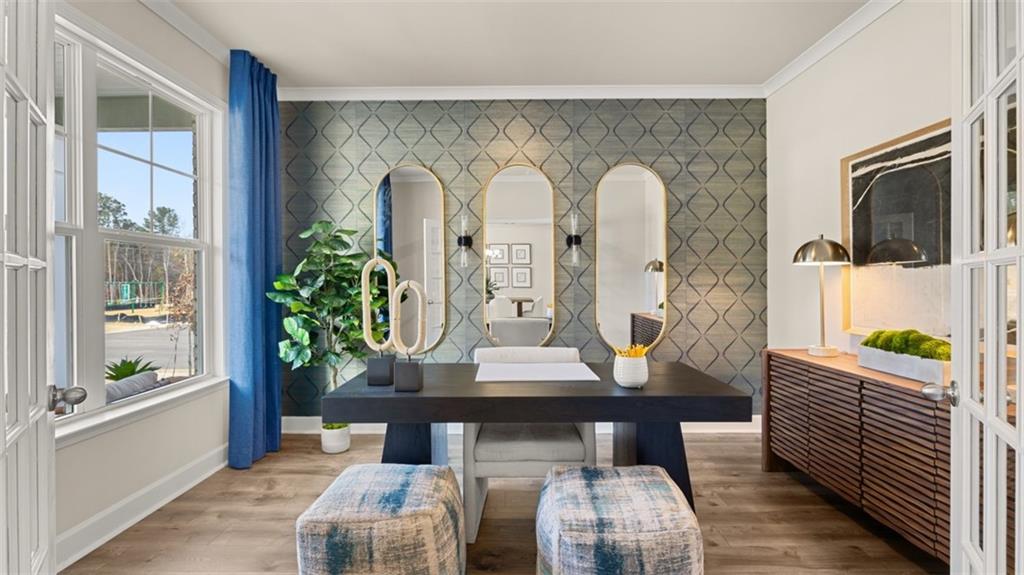 1787 Goodwin Drive Hampton, GA 30228 - Photo 10 of 55 a living room with furniture and a potted plant