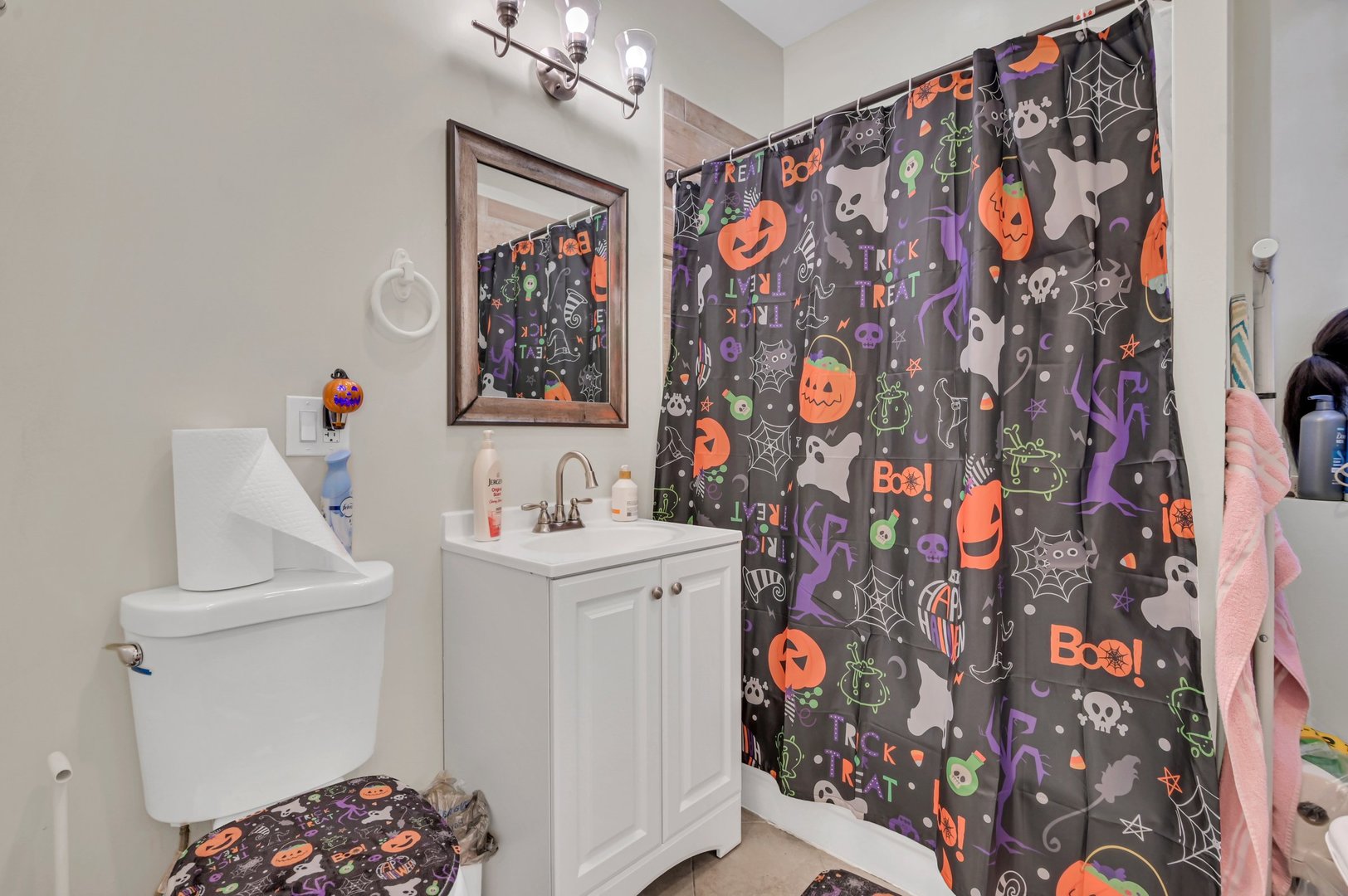 7208 South Eberhart Avenue Chicago, IL 60619 - Photo 12 of 20 a bathroom with a sink and a mirror