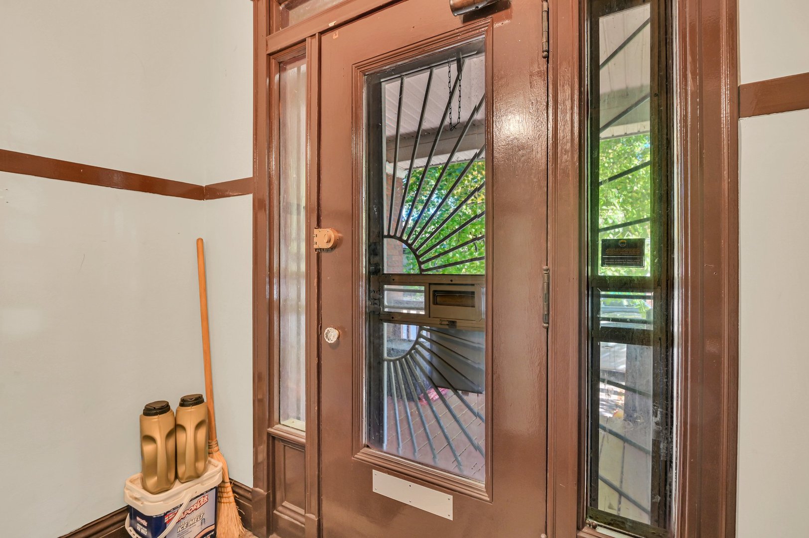 7208 South Eberhart Avenue Chicago, IL 60619 - Photo 3 of 20 a view of front door