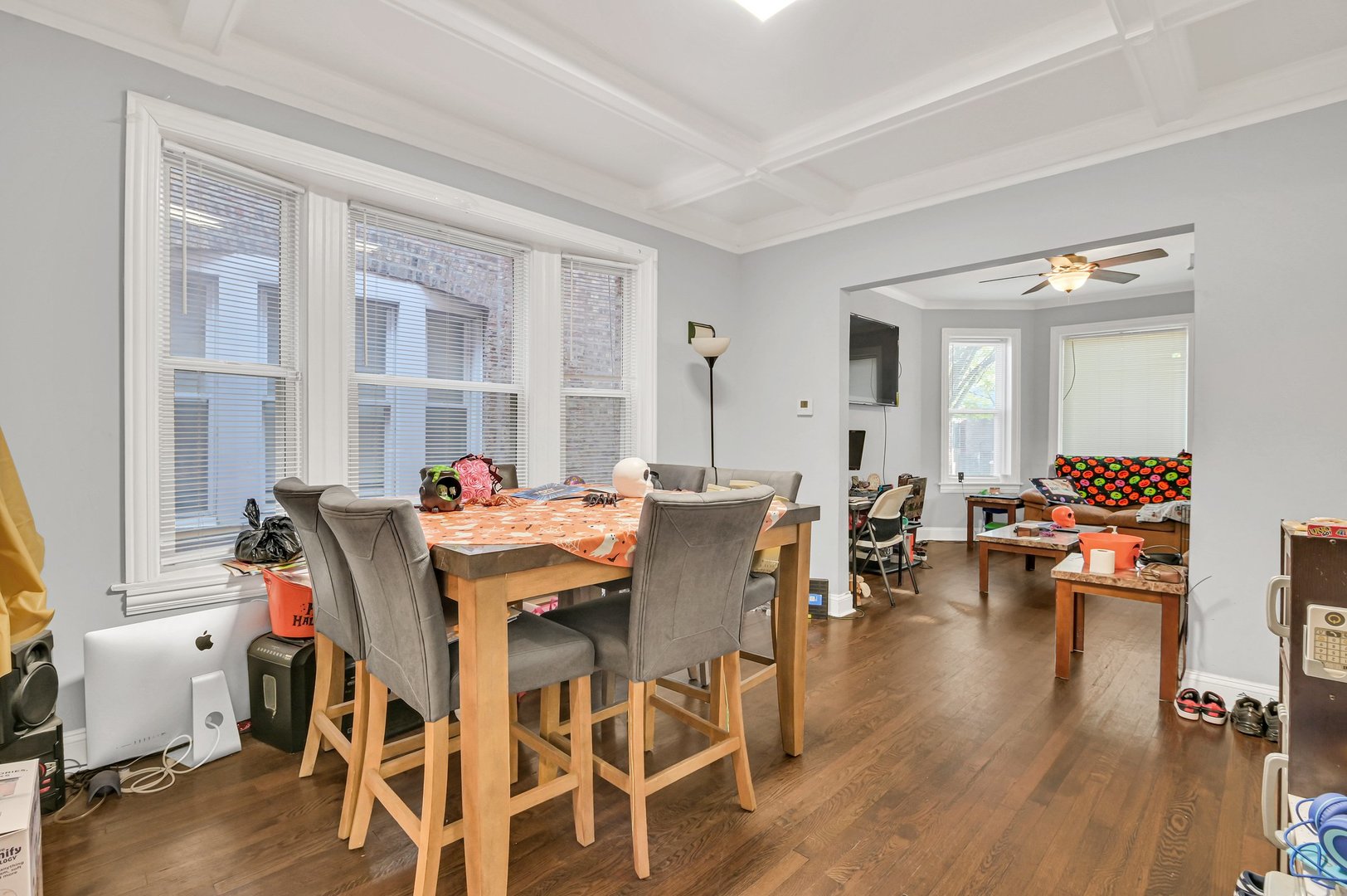 7208 South Eberhart Avenue Chicago, IL 60619 - Photo 5 of 20 a view of a dining room with furniture and wooden floor