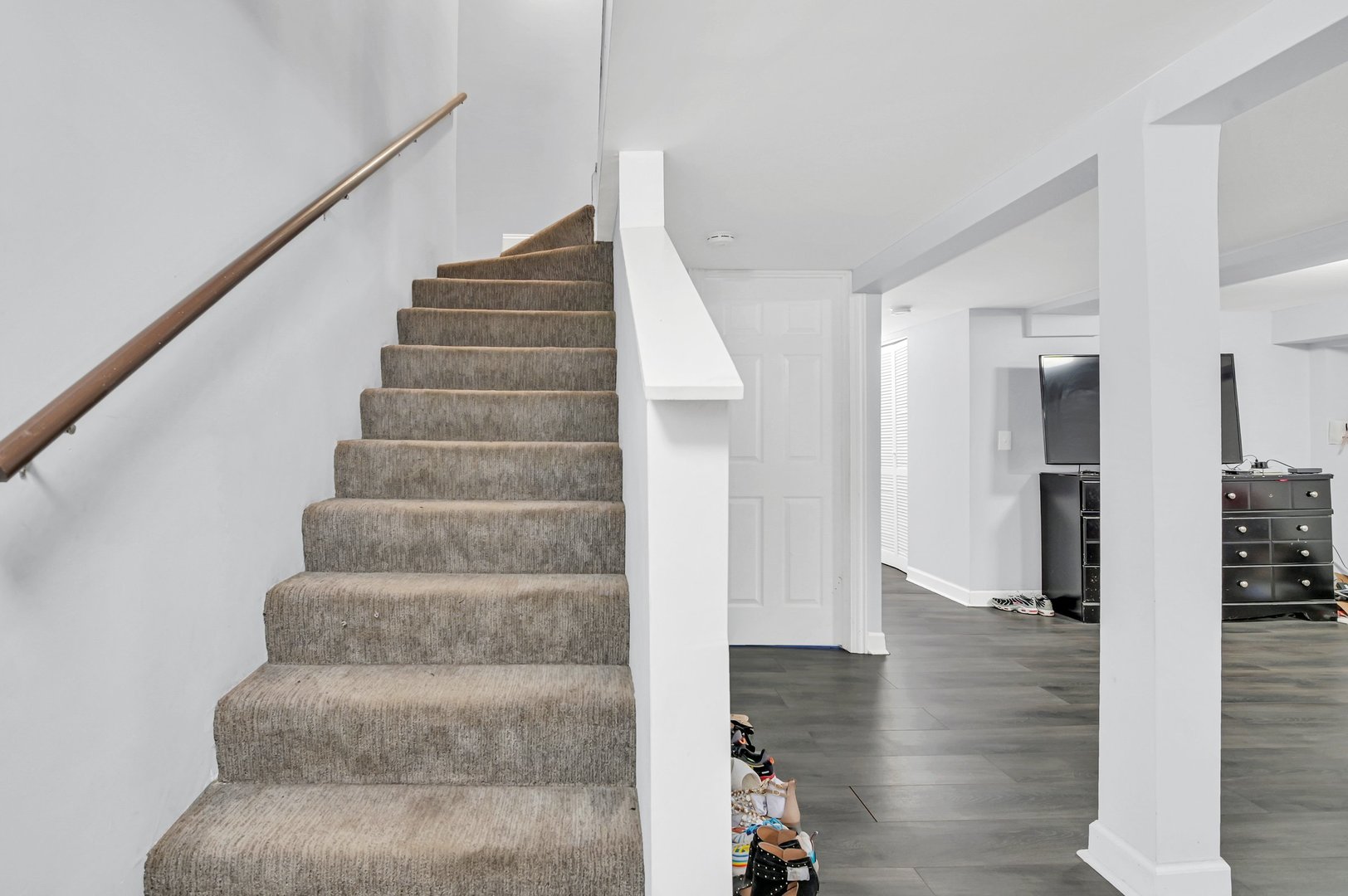 7208 South Eberhart Avenue Chicago, IL 60619 - Photo 7 of 20 a view of entryway and hall with wooden floor
