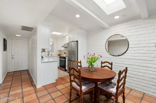 a view of a dining room with furniture