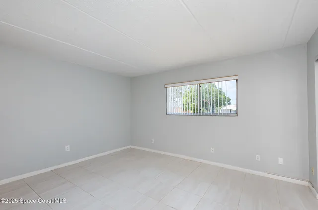 $130,000 | 1001 West Eau Gallie Boulevard, Unit 205, Melbourne, FL 32935