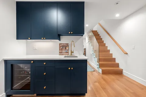 a view of entryway with cabinets