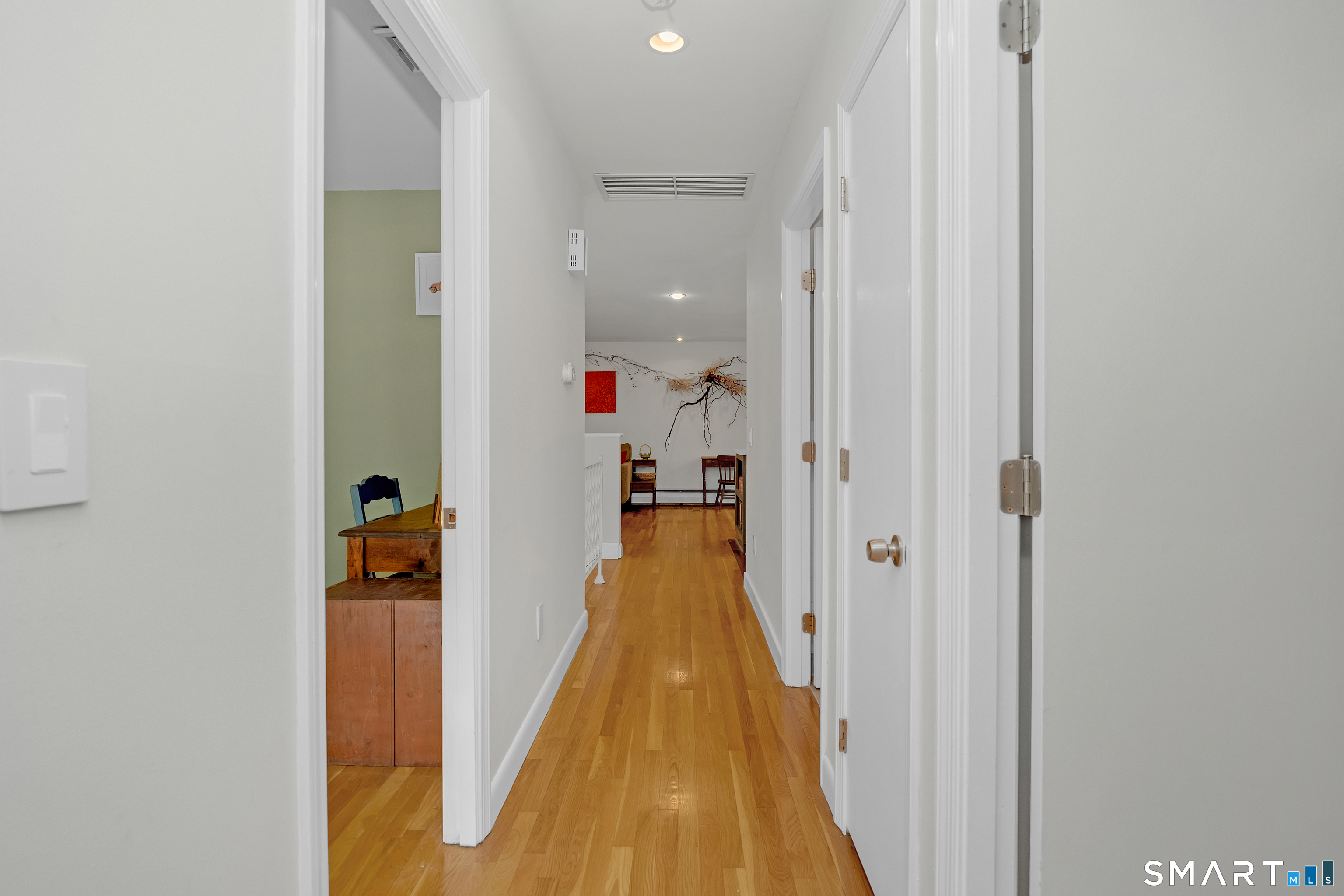 16 Marion Road Bethany, CT 06524 - Photo 17 of 40 a view of a hallway with wooden floor and staircase