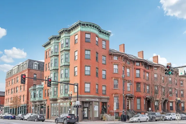 a view of a building with a street