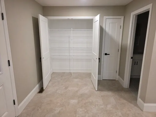 an empty room with closet