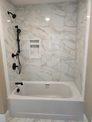 a bathroom with a bathtub