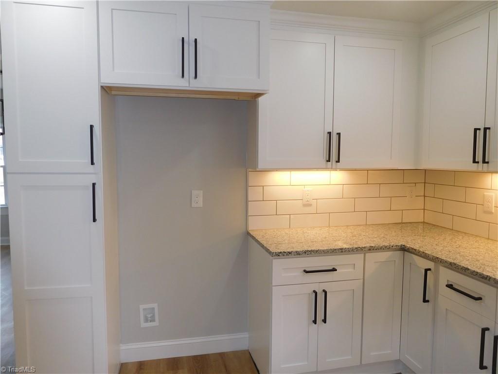 3830 Robinhood Road Winston-Salem, NC 27106 - Photo 13 of 30 BUILT-IN PANTRY FOR ADDITIONAL STORAGE.