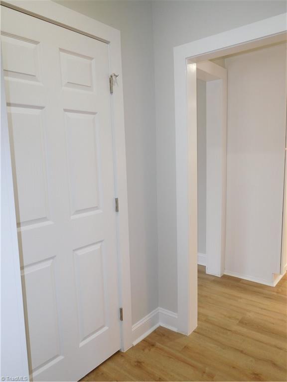 3830 Robinhood Road Winston-Salem, NC 27106 - Photo 16 of 30 HALLWAY HOLDS LAUNDRY ROOM AND FULL BATH.