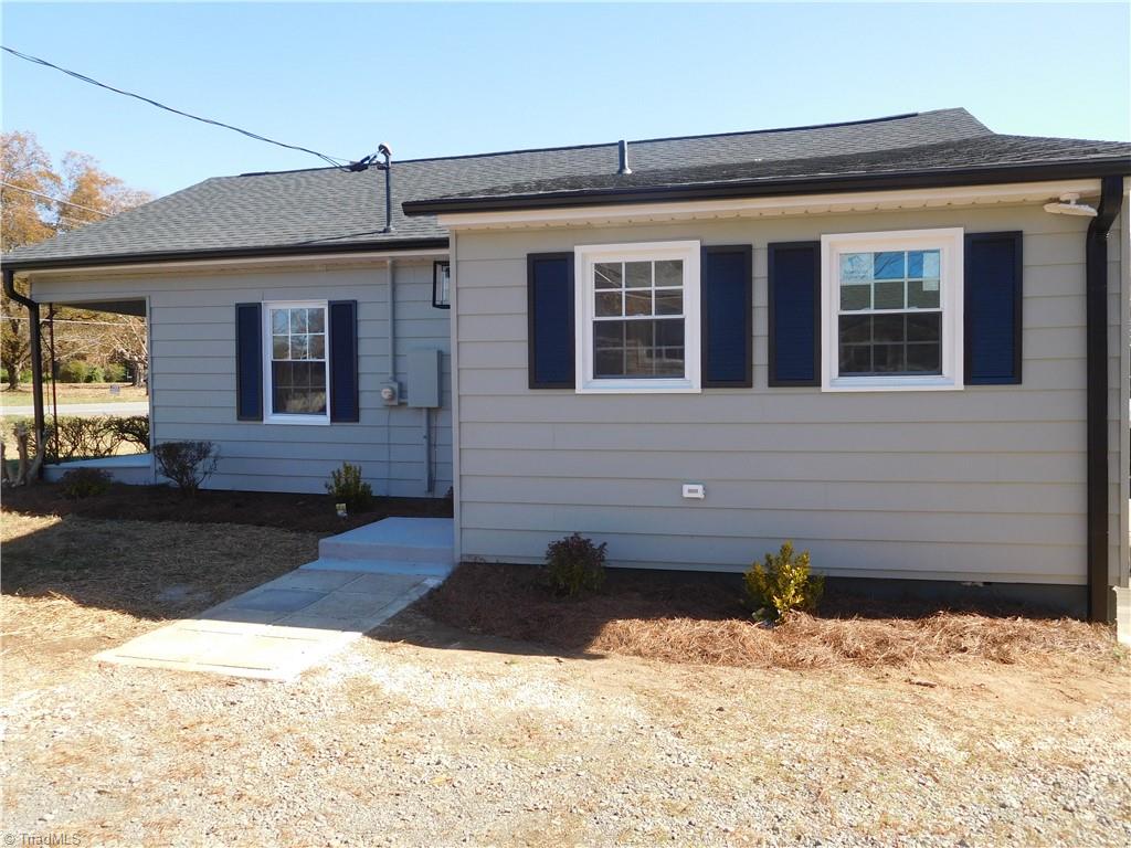 3830 Robinhood Road Winston-Salem, NC 27106 - Photo 23 of 30 SIDE VIEW OF HOME.