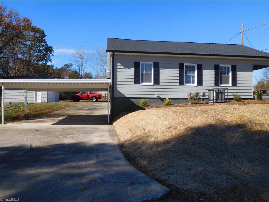 3830 Robinhood Road Winston-Salem, NC 27106 - Photo 25 of 30 THIS DRIVEWAY IS OFF ROBIN AVE. ATTACHED CARPORT.