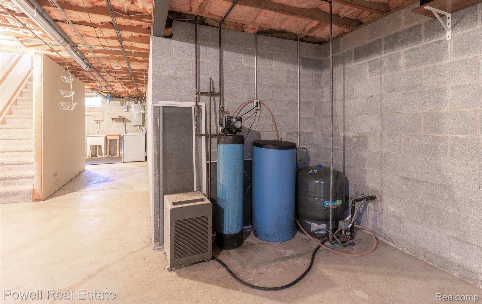 1699 Smith Road Lapeer, MI 48446 - Photo 36 of 54 Basement Water Softener Stays with house.jpg