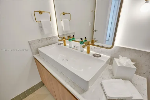 a bathroom with a sink and a toilet