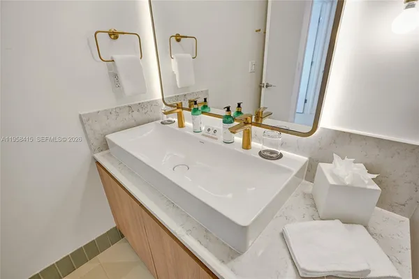 a bathroom with a sink and a toilet
