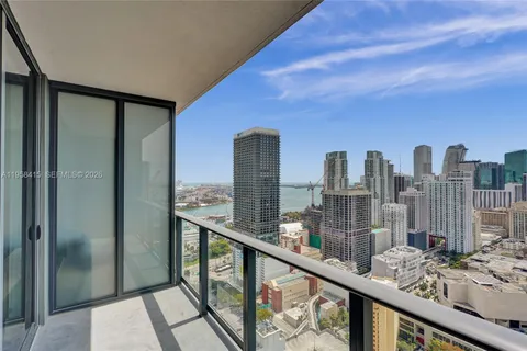 a view of a balcony with city view