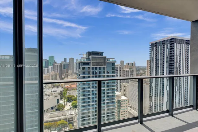 a view of a balcony with city view