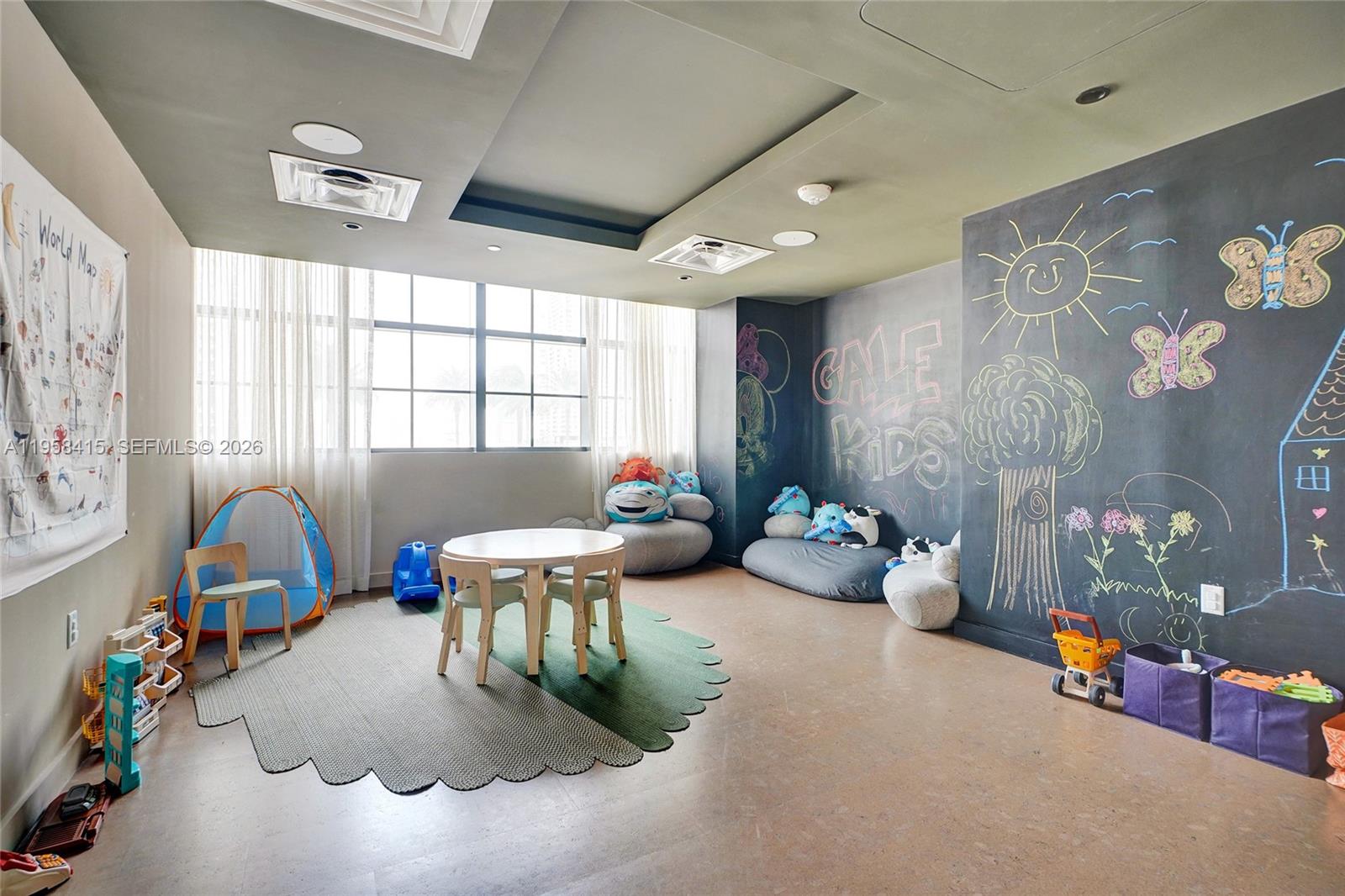 159 Northeast 6th Street, Unit 3405 Miami, FL 33132 - Photo 37 of 37 a living room with furniture and a chandelier