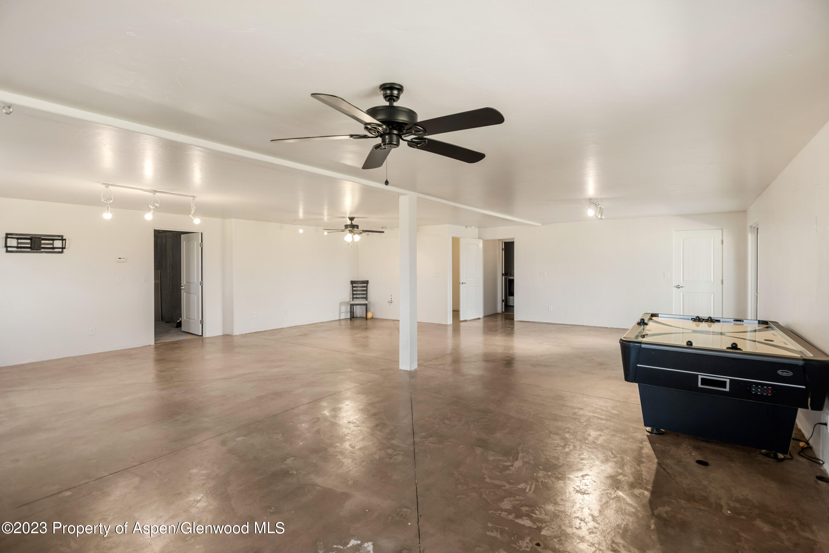 1148 County Road 237 Silt, CO 81652 - Photo 26 of 80 a view of a livingroom with a furniture and a ceiling fan