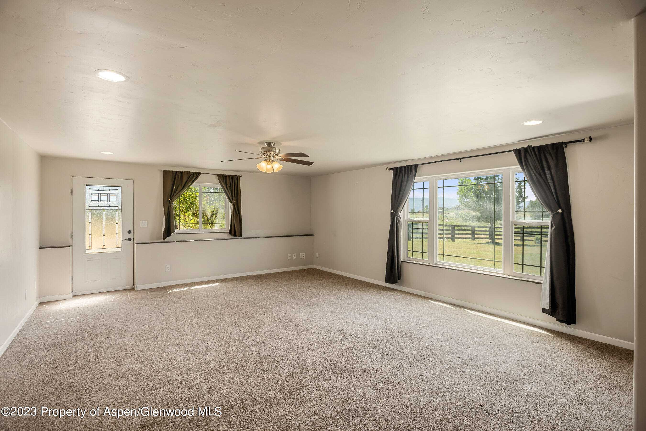 1148 County Road 237 Silt, CO 81652 - Photo 36 of 80 an empty room with windows