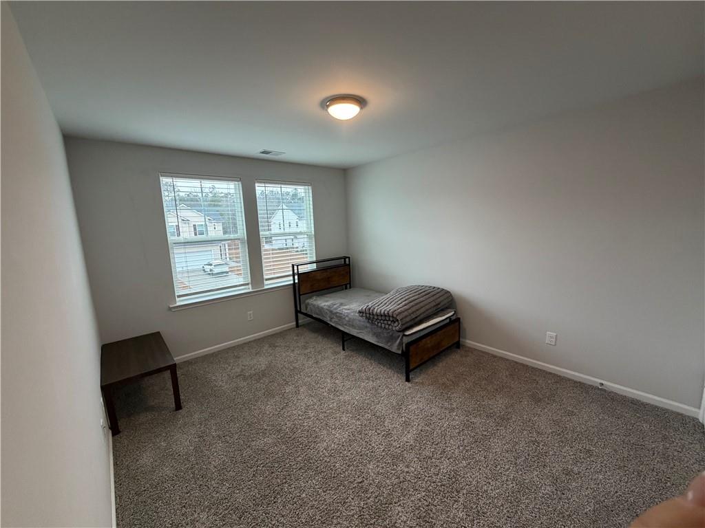 16 Jazz Drive Pooler, GA 31322 - Photo 11 of 17 an empty room with windows and closet