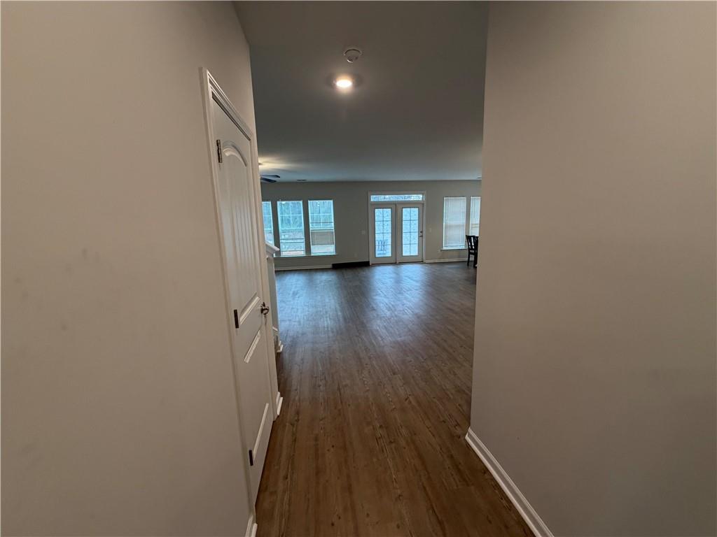 16 Jazz Drive Pooler, GA 31322 - Photo 4 of 17 a view of hallway with wooden floor and stairs