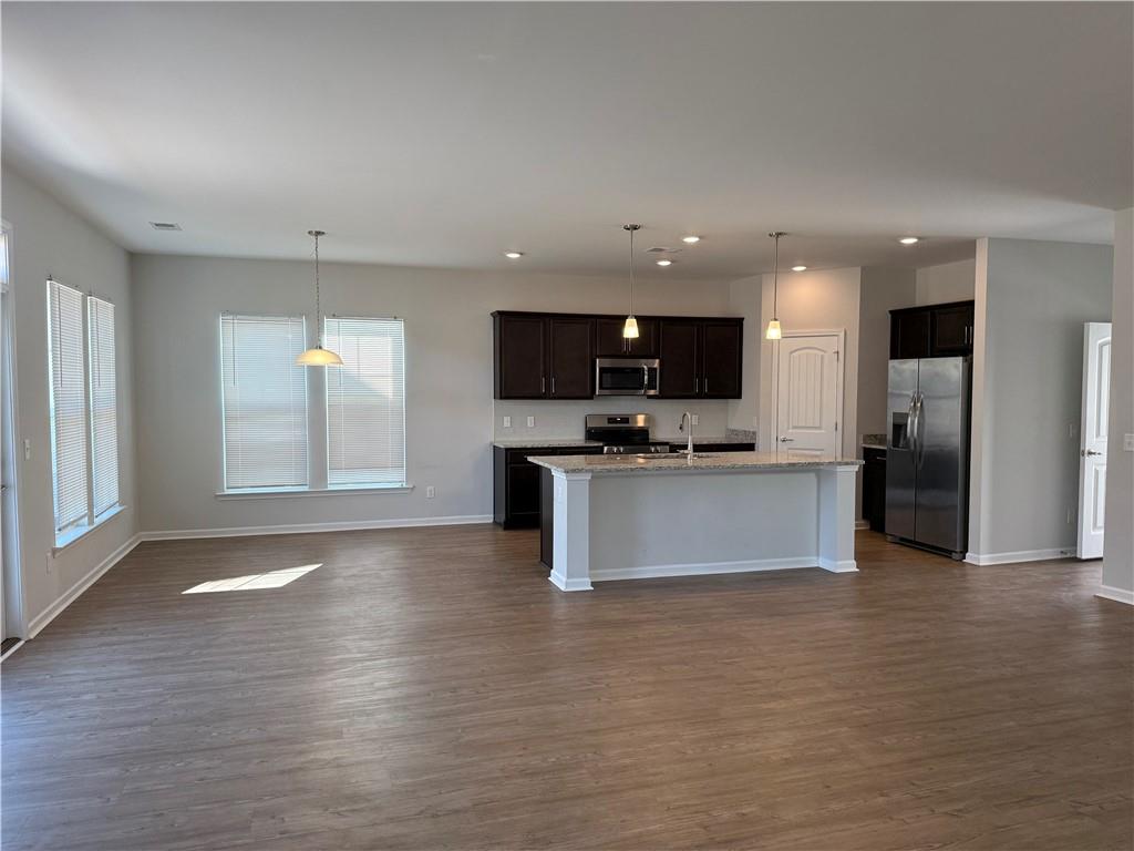16 Jazz Drive Pooler, GA 31322 - Photo 5 of 17 a view of kitchen with refrigerator stove microwave and cabinets