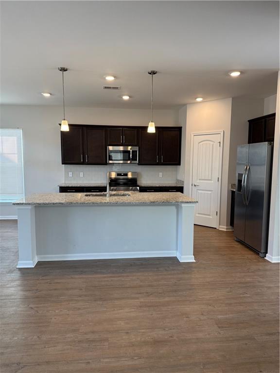16 Jazz Drive Pooler, GA 31322 - Photo 6 of 17 a view of kitchen with refrigerator stove and microwave