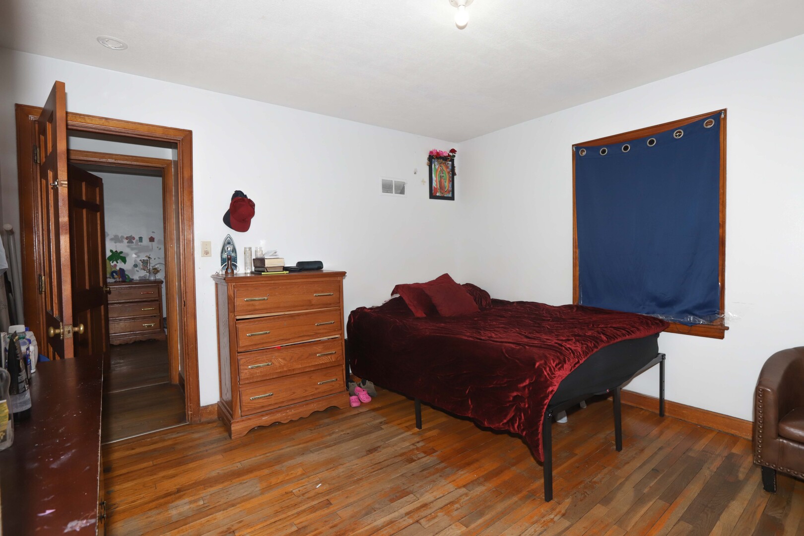 900 Garfield Road Harvard, IL 60033 - Photo 5 of 17 a living room with a bed and furniture