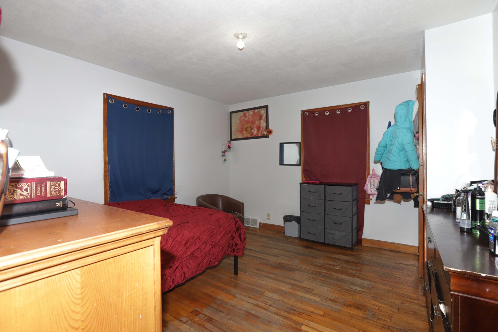 900 Garfield Road Harvard, IL 60033 - Photo 6 of 17 a bed room with a bed and a television