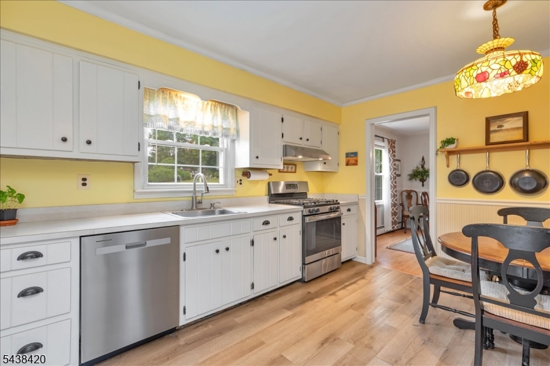 79 Main Street Califon, NJ 07830 - Photo 14 of 50 a kitchen with cabinets a sink and appliances
