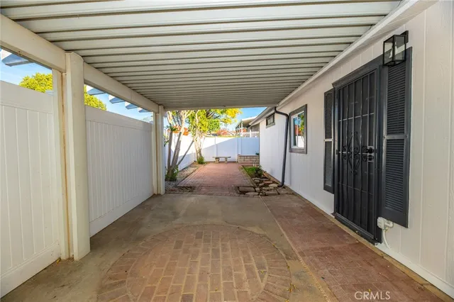 an aerial view of a residential apartment building with a yard