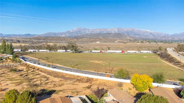 an aerial view of a house with garden space and houses view