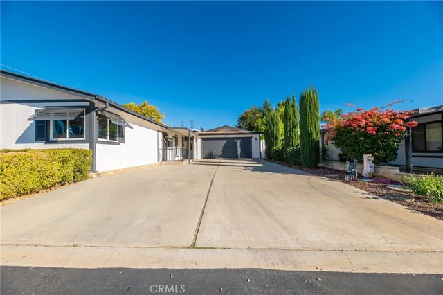 a house view with a garden space