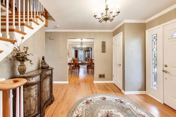 a view of a living room and dining room