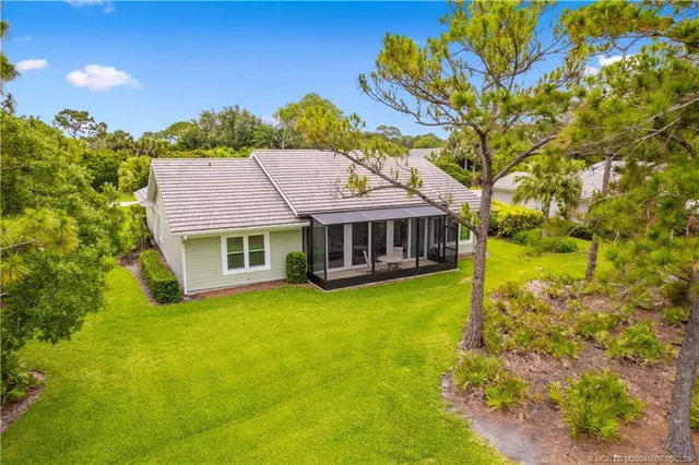 a view of a house with a big yard
