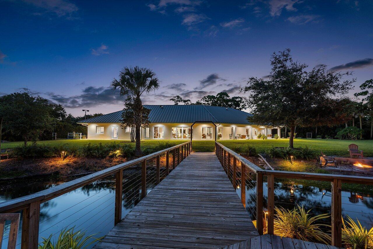 6624 Dillman Road Greenacres, FL 33413 - Photo 4 of 77 Twilight Backyard