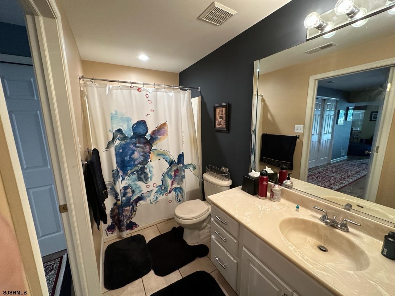 9 Ruth Court Absecon, NJ 08201 - Photo 20 of 38 a bathroom with a sink toilet and shower