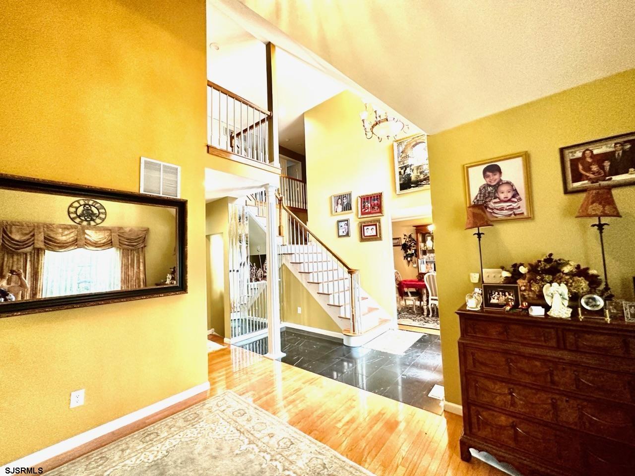 9 Ruth Court Absecon, NJ 08201 - Photo 2 of 38 a view of a living room and bathroom
